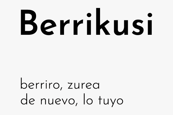 Berrikusi, Nombre y lema: Una nueva mirada. Izena eta leloa: Begirada berri bat